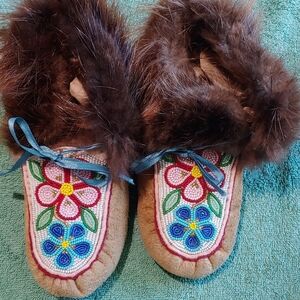Women's hand beaded leather moccasins.